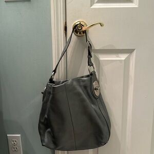 Stylish silver Coach purse